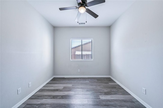 6102 S Scorpion Ln, Fort Mohave, AZ 86426 - empty room with ceiling fan and wood finished floors