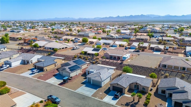 6102 S Scorpion Ln, Fort Mohave, AZ 86426 - aerial perspective of suburban area with a mountain backdrop