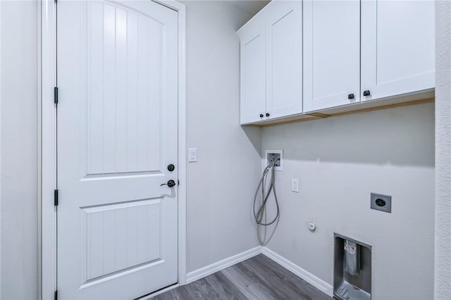 6102 S Scorpion Ln, Fort Mohave, AZ 86426 - washroom with cabinet space, hookup for a washing machine, dark wood-style floors, electric dryer hookup, and hookup for a gas dryer