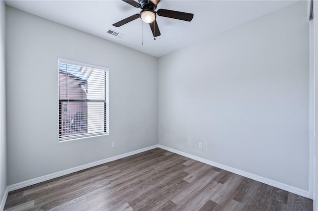 6102 S Scorpion Ln, Fort Mohave, AZ 86426 - spare room with wood finished floors and a ceiling fan