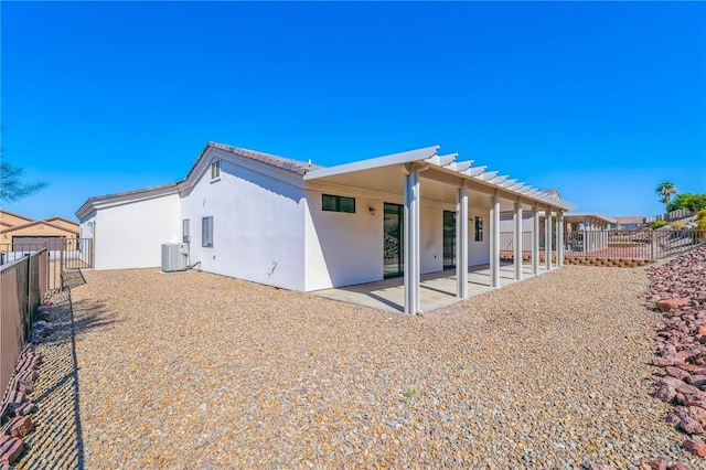 6102 S Scorpion Ln, Fort Mohave, AZ 86426 - rear view of property with a patio area, stucco siding, a fenced backyard, and a tiled roof