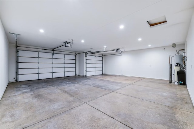 6102 S Scorpion Ln, Fort Mohave, AZ 86426 - garage with recessed lighting, water heater, and a garage door opener