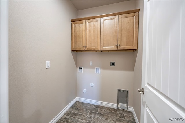 laundry room with cabinet space, baseboards, gas dryer hookup, hookup for a washing machine, and electric dryer hookup