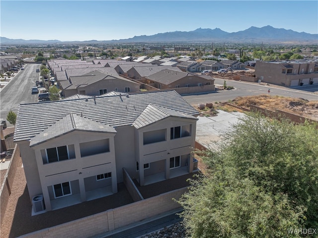 bird's eye view with a residential view and a mountain view