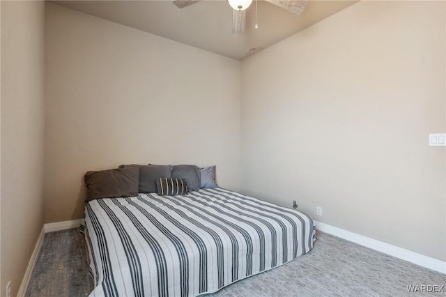 carpeted bedroom with baseboards