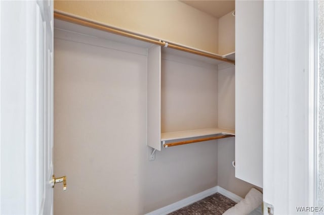 walk in closet with built in desk