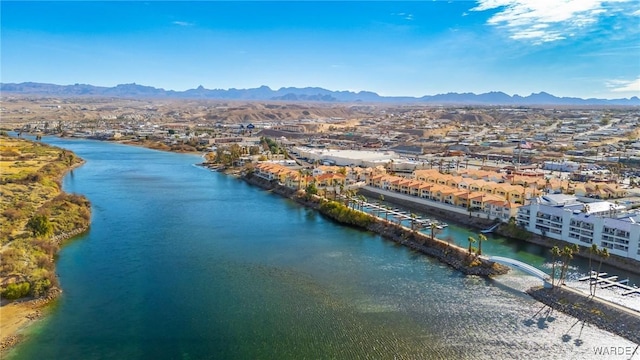 bird's eye view featuring a water and mountain view