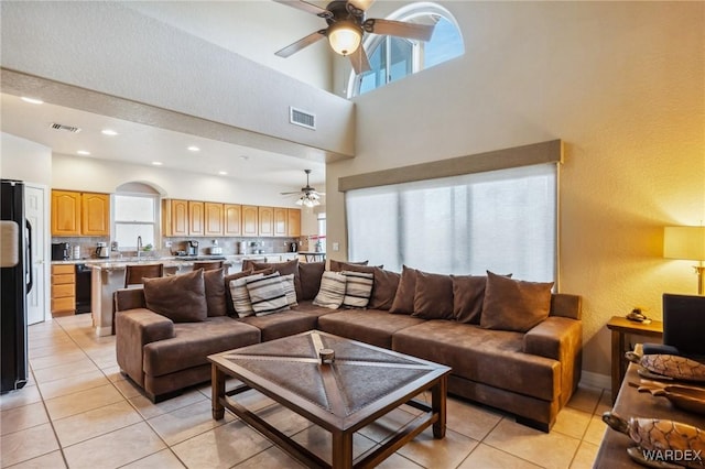 living room featuring recessed lighting, visible vents, and ceiling fan