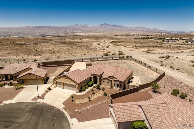 bird's eye view with a mountain view and a desert view