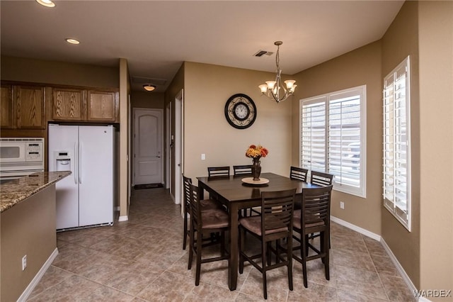 dining area with light tile patterned floors, recessed lighting, visible vents, baseboards, and an inviting chandelier