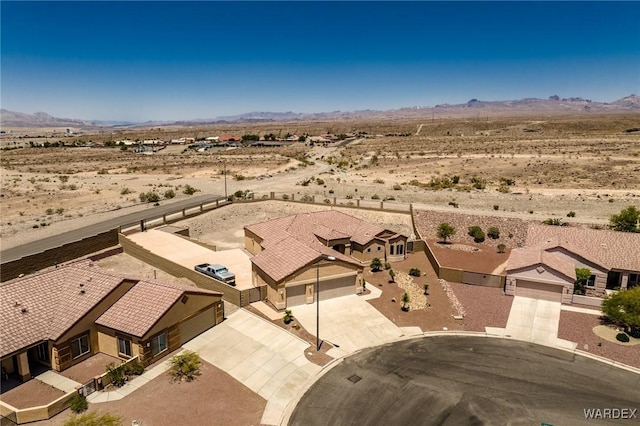 bird's eye view featuring a mountain view and a desert view