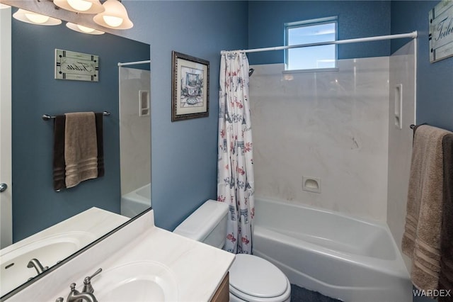 bathroom featuring toilet, shower / tub combo with curtain, and vanity