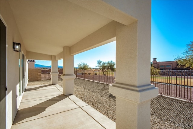 view of patio with fence