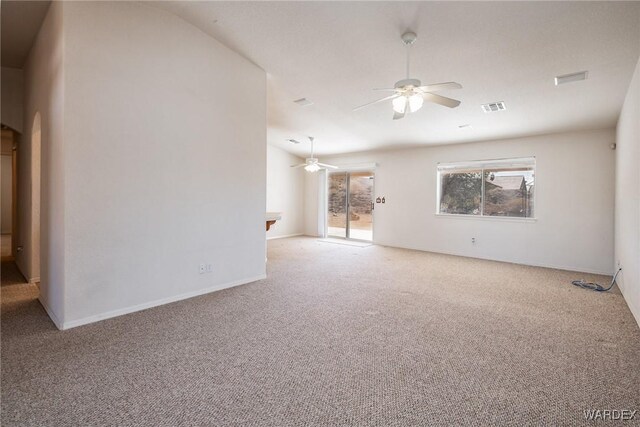 empty room featuring baseboards, visible vents, a ceiling fan, and light colored carpet