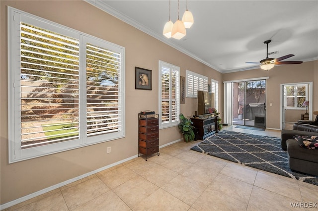 interior space with light tile patterned floors, baseboards, and crown molding