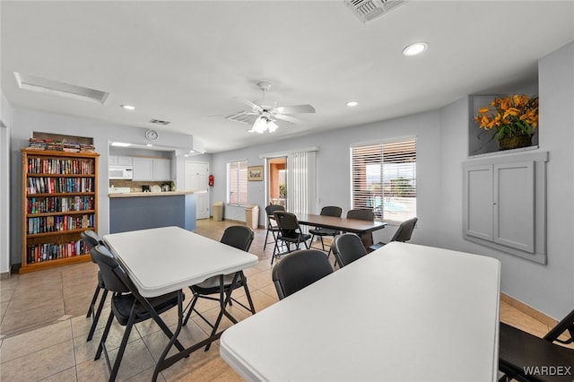 dining space featuring recessed lighting, visible vents, ceiling fan, and light tile patterned flooring