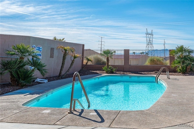 view of pool featuring fence and a fenced in pool