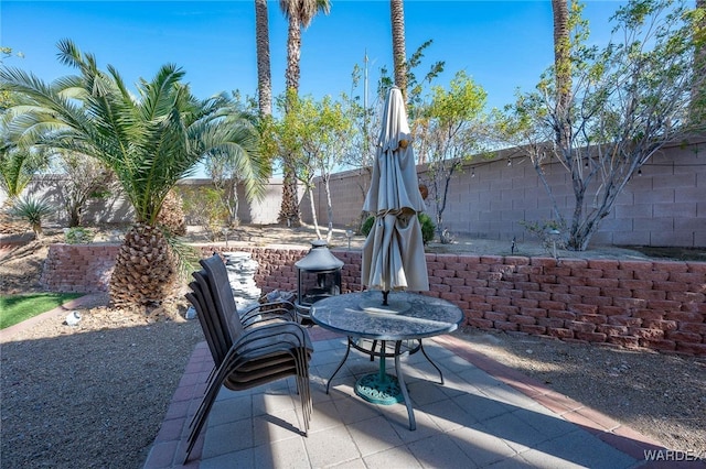 view of patio featuring a fenced backyard