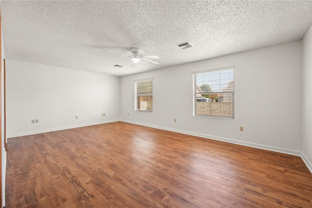 2218 Family Cir, Bullhead City, AZ 86442 - spare room featuring ceiling fan, wood finished floors, and a textured ceiling