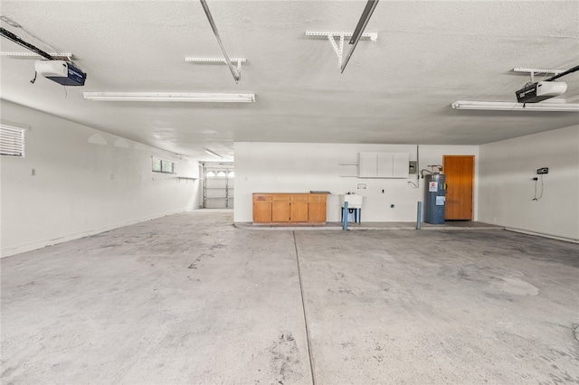 2218 Family Cir, Bullhead City, AZ 86442 - garage with water heater and a garage door opener