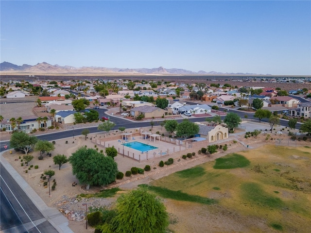 2218 Family Cir, Bullhead City, AZ 86442 - aerial view of residential area featuring a mountain backdrop and a pool