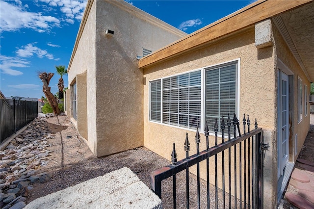 2218 Family Cir, Bullhead City, AZ 86442 - view of side of home with stucco siding