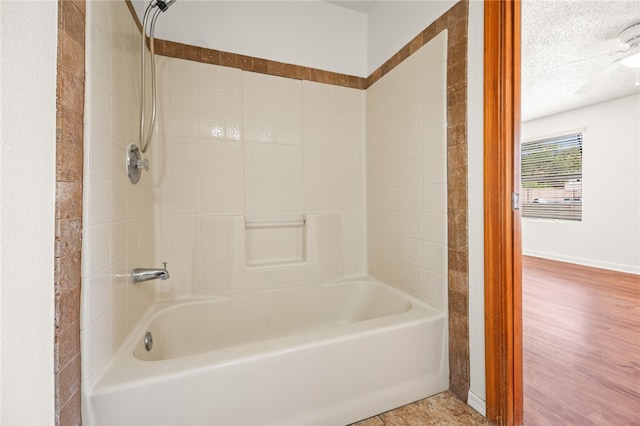 2218 Family Cir, Bullhead City, AZ 86442 - bathroom with  shower combination and a textured ceiling