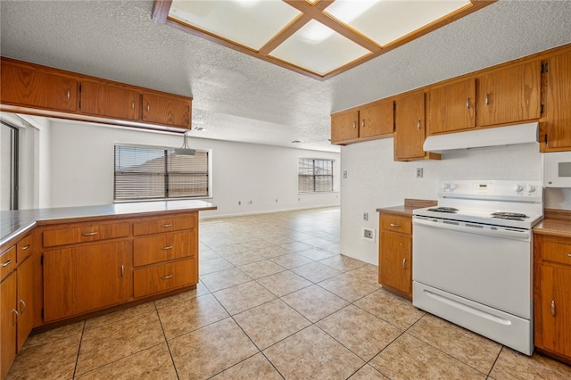 2218 Family Cir, Bullhead City, AZ 86442 - kitchen featuring electric range, a textured ceiling, under cabinet range hood, and brown cabinets