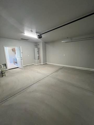 3521 E Lum Ave, Kingman, AZ 86409 - garage featuring water heater and baseboards