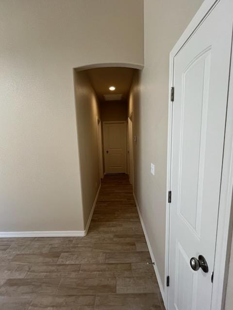 3521 E Lum Ave, Kingman, AZ 86409 - hallway with wood finished floors, baseboards, arched walkways, and recessed lighting