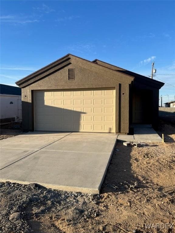 garage with driveway