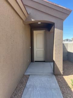 3521 E Lum Ave, Kingman, AZ 86409 - view of exterior entry featuring stucco siding
