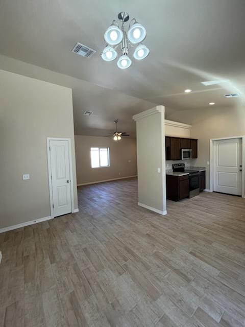 3521 E Lum Ave, Kingman, AZ 86409 - unfurnished living room with baseboards, a chandelier, light wood-style flooring, and ceiling fan