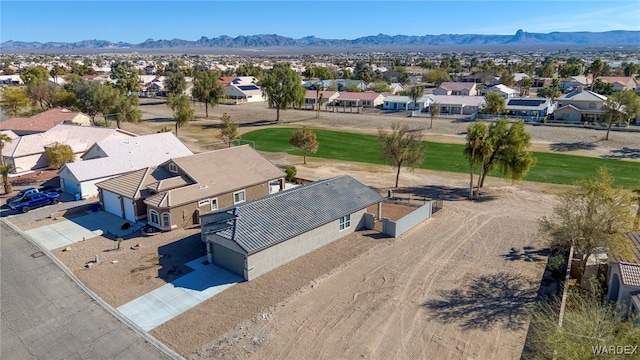 birds eye view of property with a residential view and a mountain view