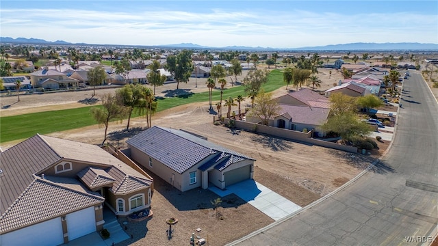 aerial view featuring a mountain view and a residential view