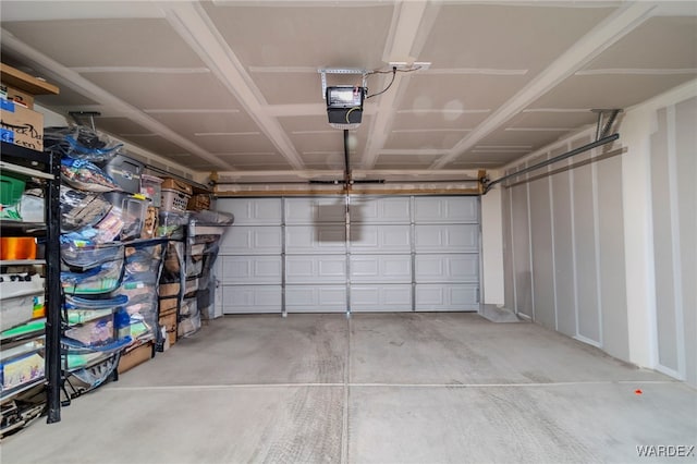 garage featuring a garage door opener