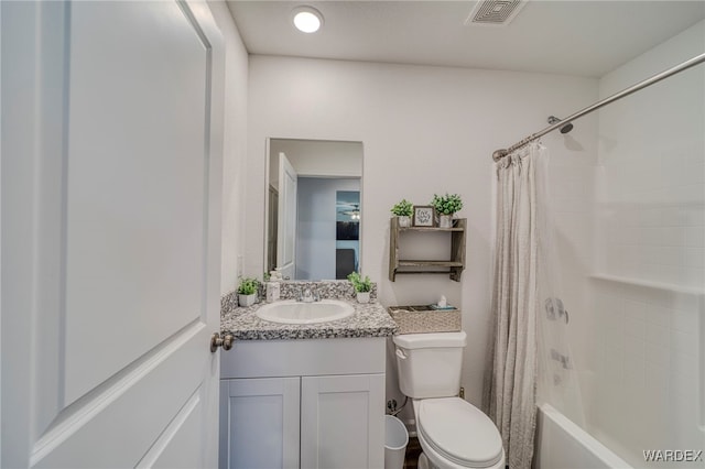 bathroom with shower / tub combo, visible vents, vanity, and toilet