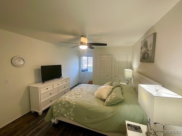 bedroom with a ceiling fan, a closet, and dark wood finished floors