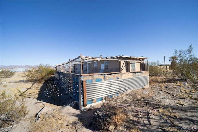 exterior space with an outbuilding