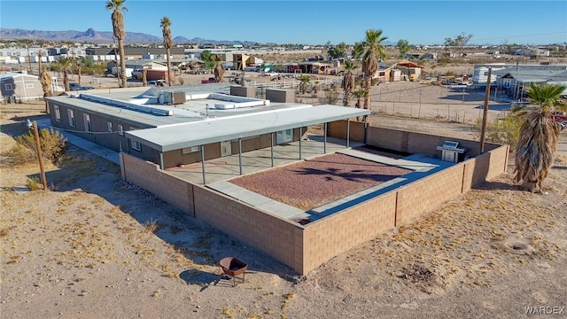 birds eye view of property featuring a residential view and a mountain view