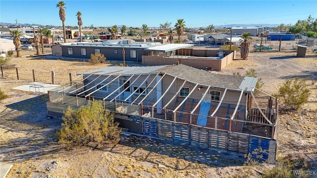 exterior space with a residential view and an outdoor structure