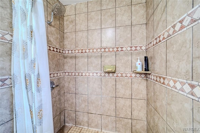 bathroom featuring tiled shower