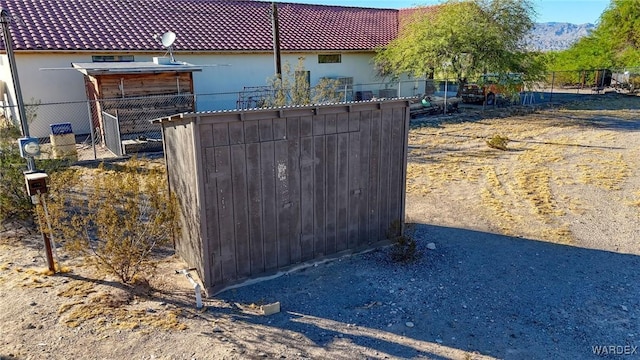 exterior details with fence and a mountain view