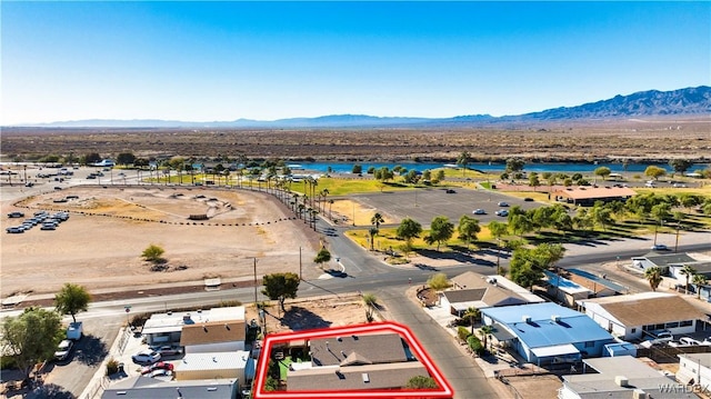 bird's eye view with a residential view and a water and mountain view