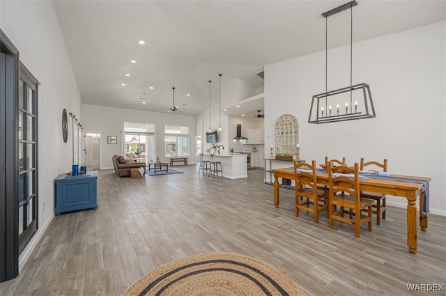 2044 E Los Lagos Dr, Fort Mohave, AZ 86426 - dining room featuring a ceiling fan, high vaulted ceiling, light wood finished floors, and recessed lighting