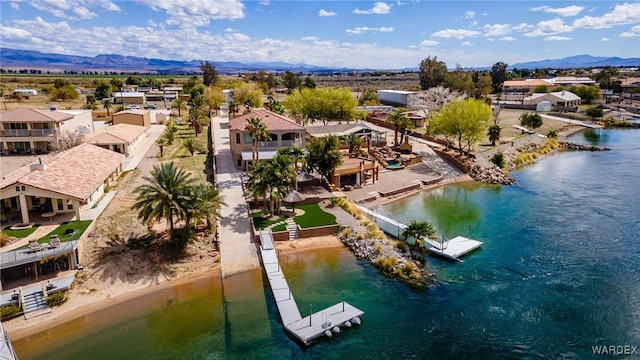 aerial view with a residential view and a water and mountain view