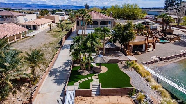 birds eye view of property featuring a residential view and a mountain view