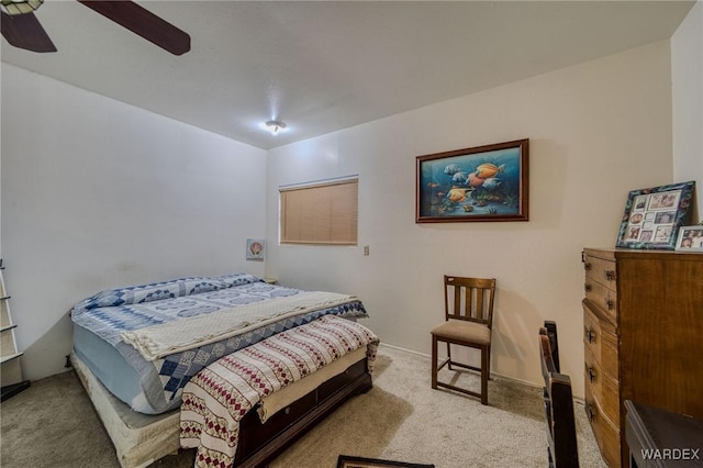 bedroom featuring a ceiling fan and carpet flooring