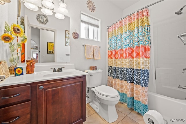 bathroom featuring tile patterned floors, toilet, shower / bath combo, and vanity