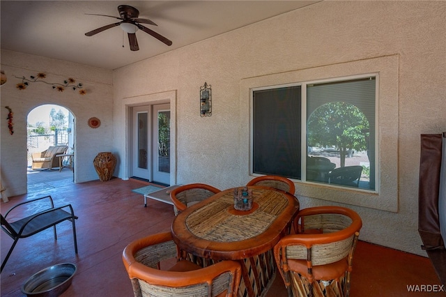 view of patio / terrace with french doors and ceiling fan